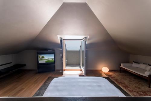 Hotel Bella Rivaにあるベッド