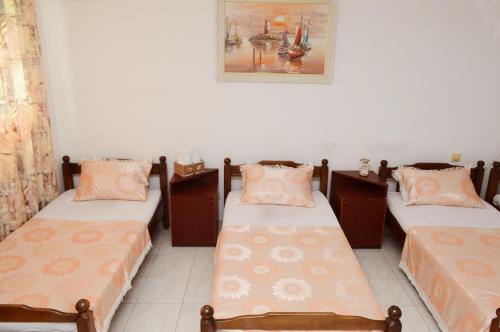 Ένα ή περισσότερα κρεβάτια σε δωμάτιο στο Guest House Lukac