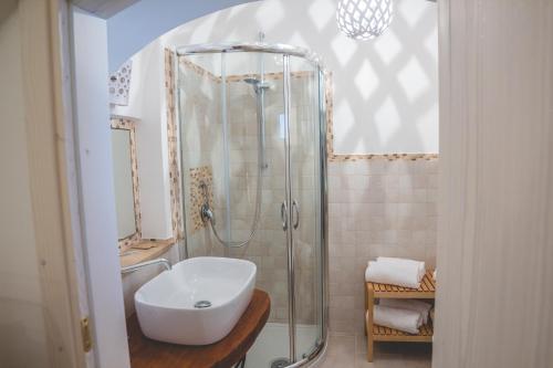 Koupelna v ubytování Trulli-eu Guesthouse Alberobello