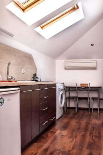 Kuchyň nebo kuchyňský kout v ubytování Apartment Elegant