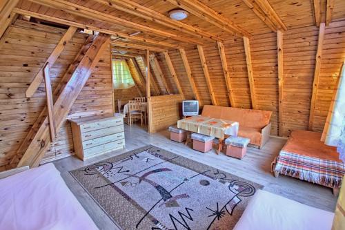 an overhead view of a living room in a log cabin at Borowinka in Ustka