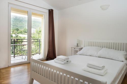 Postel nebo postele na pokoji v ubytování Villa Mira