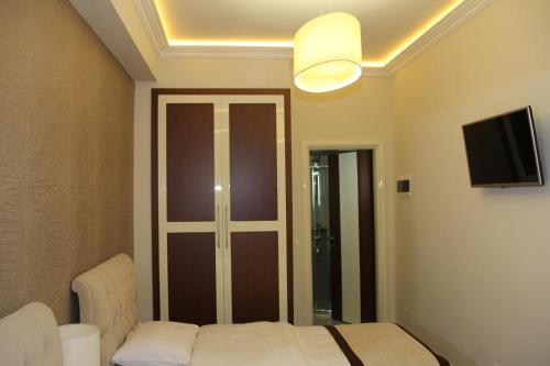 Hotel Vila Alfaにあるベッド