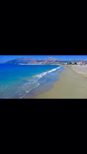 a view of a beach with the ocean at Heraklion Gortyn Phaistos House in Mitrópolis