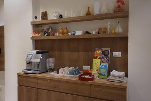a kitchen counter with a coffee maker on it at Ecology River in Dongshan