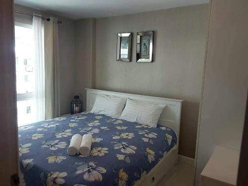 Postel nebo postele na pokoji v ubytování The Energy Seaside Condo 2 Bedrooms By AP