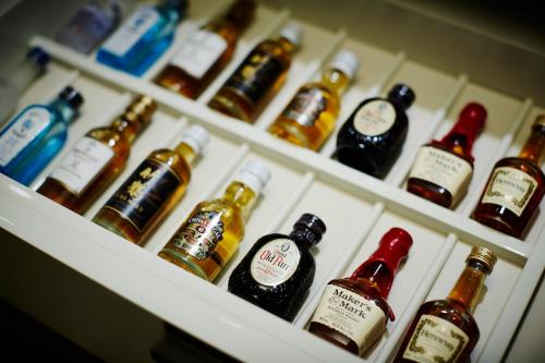 a refrigerator filled with lots of bottles of alcohol at Keio Plaza Hotel Tokyo Premier Grand in Tokyo