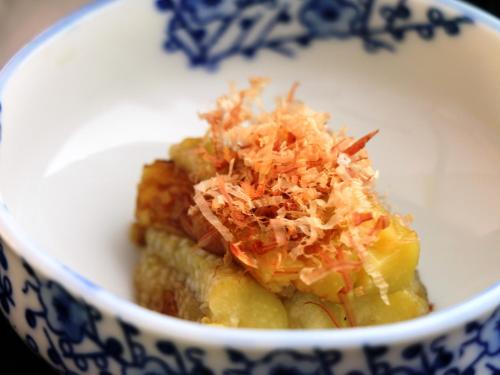 a blue and white bowl with food in it at Komao in Kiso