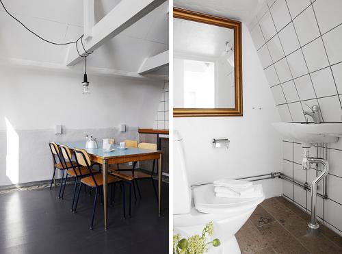 ein Badezimmer mit einem Tisch und ein Badezimmer mit einem Waschbecken in der Unterkunft Gotland Magazin1 Guesthouse in Havdhem