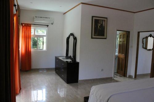Ένα ή περισσότερα κρεβάτια σε δωμάτιο στο Julie's Holiday Home