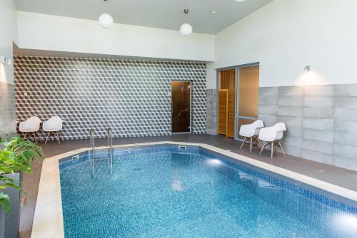 Bazén v ubytování Hotel Sigulda nebo v jeho okolí