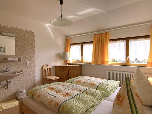 En eller flere senge i et værelse på Gasthaus Zur Linde