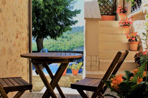 a table and chairs on a balcony with a view at La Zaffera in Alatri