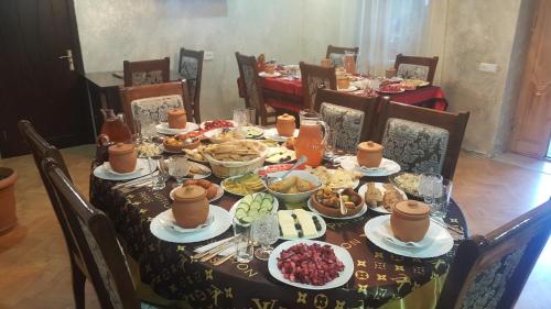 a table full of food on a table at Mestia 4 season in Mestia