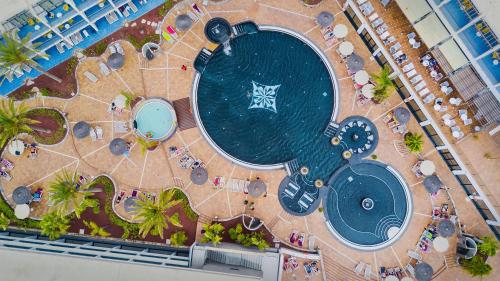 an overhead view of a swimming pool on a cruise ship at Hotel Mirador Papagayo by LIVVO in Playa Blanca
