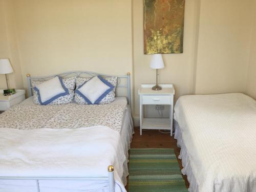 Ein Bett oder Betten in einem Zimmer der Unterkunft Chiemseevilla