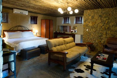 Krevet ili kreveti u jedinici u okviru objekta Emoya Basotho Lodge