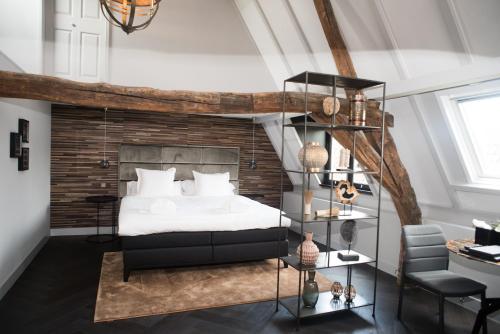 Postel nebo postele na pokoji v ubytování Hotel 't Keershuys