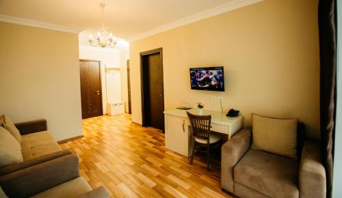 TV a/nebo společenská místnost v ubytování Kobuleti Pearl Of Sea Hotel & Spa