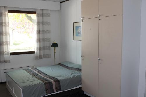Ένα ή περισσότερα κρεβάτια σε δωμάτιο στο Guesthouse - Kuin Kotonaan