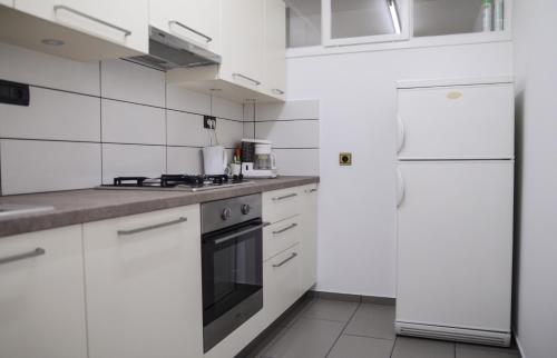 Cucina o angolo cottura di Apartments Jaklin Rovinj