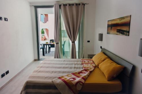 Un pat sau paturi într-o cameră la Villa Riviera
