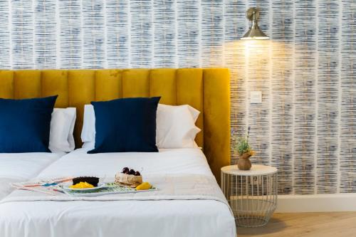 Un ou plusieurs lits dans un hébergement de l'établissement Premium Home Gran Vía