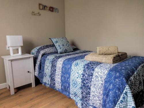 Posteľ alebo postele v izbe v ubytovaní DREAMSUITES MARIN GARCIA.