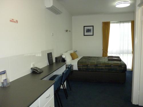 Postel nebo postele na pokoji v ubytování Otway Gate Motel