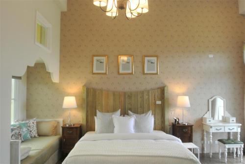 Katil atau katil-katil dalam bilik di Bell Cottage B&B