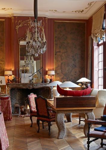a living room with a couch and a table at B&B The Verhaegen in Ghent
