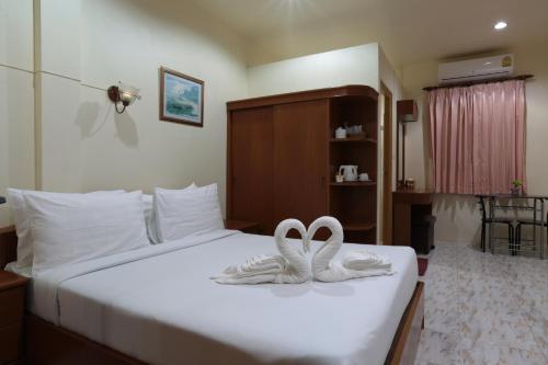 Katil atau katil-katil dalam bilik di Khun Ying House