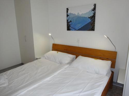 Ένα ή περισσότερα κρεβάτια σε δωμάτιο στο Apartment Edelweiss