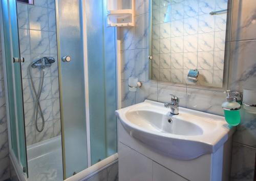 Koupelna v ubytování Apartments Sabljak