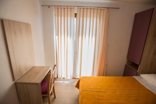 Un ou plusieurs lits dans un hébergement de l'établissement Apartmani Šimić
