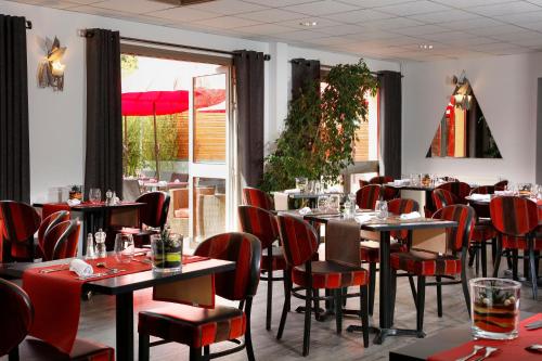 En restaurang eller annat matställe på Hôtel Restaurant Le Colibri