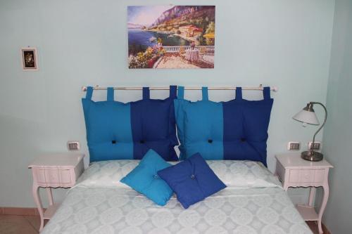 En eller flere senge i et værelse på Podere L'Isolella