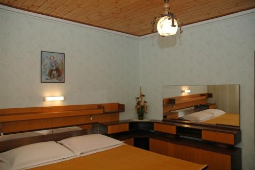 Postel nebo postele na pokoji v ubytování Guesthouse Mimas