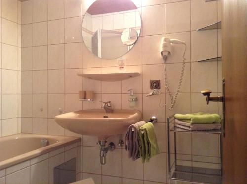 Kúpeľňa v ubytovaní Hotel Garni Almhof