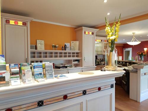 A cozinha ou kitchenette de Sylthotel Raffelhüschen Garni