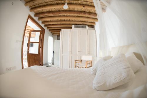 Llit o llits en una habitació de Vavla Nature House