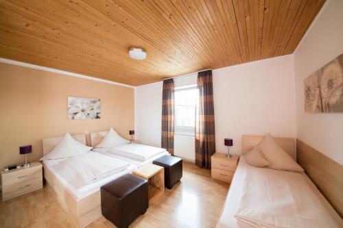 Cama o camas de una habitación en Hotel Bavaria