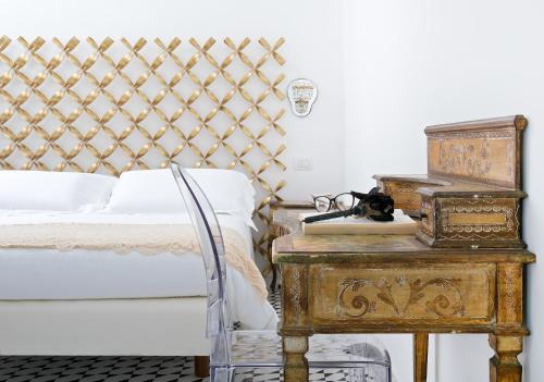 Katil atau katil-katil dalam bilik di Villa Oriana Relais
