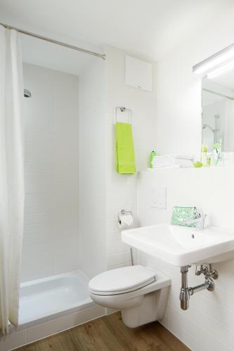 Ένα μπάνιο στο Good Rooms GmbH Bad Ischl