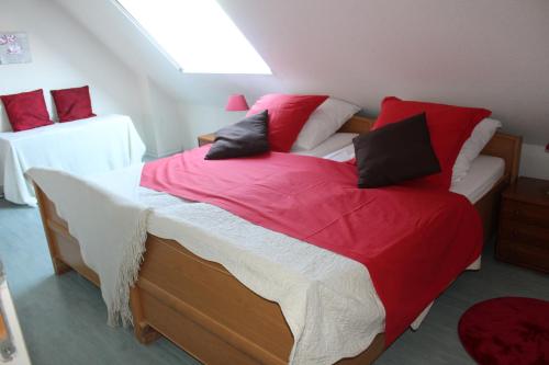 מיטה או מיטות בחדר ב-Le Port Mesnil
