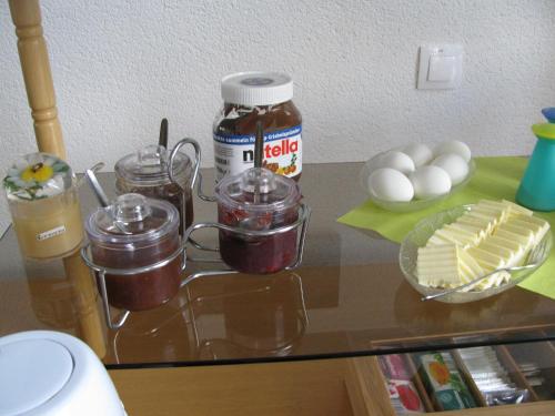a glass counter top with some food on it at Reiterhof & Pension Lienemann in Grünbach