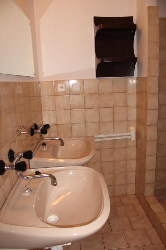 a bathroom with a sink and a toilet at Horský dům Veronika in Cerny Dul
