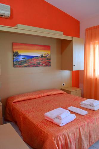 Postel nebo postele na pokoji v ubytování Villaggio Calispera