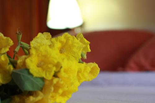 Кровать или кровати в номере The Wooden House Hotel