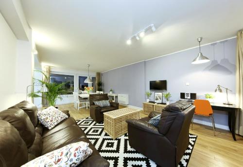 Μια τηλεόραση ή/και κέντρο ψυχαγωγίας στο Porat Apartment